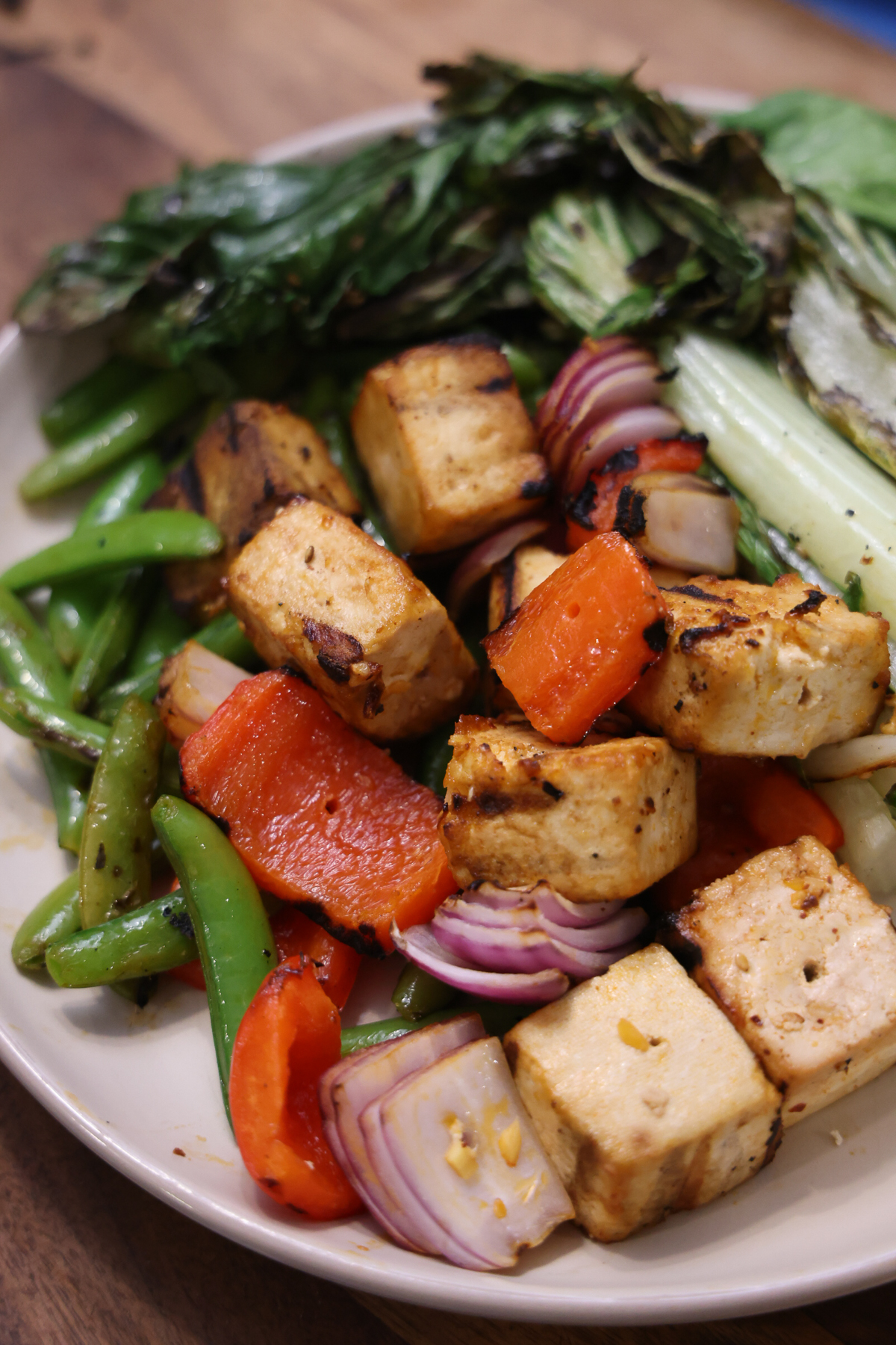 Grilled Tofu Kebabs with Chili Crisp, Snap Peas, and Bok Choy
